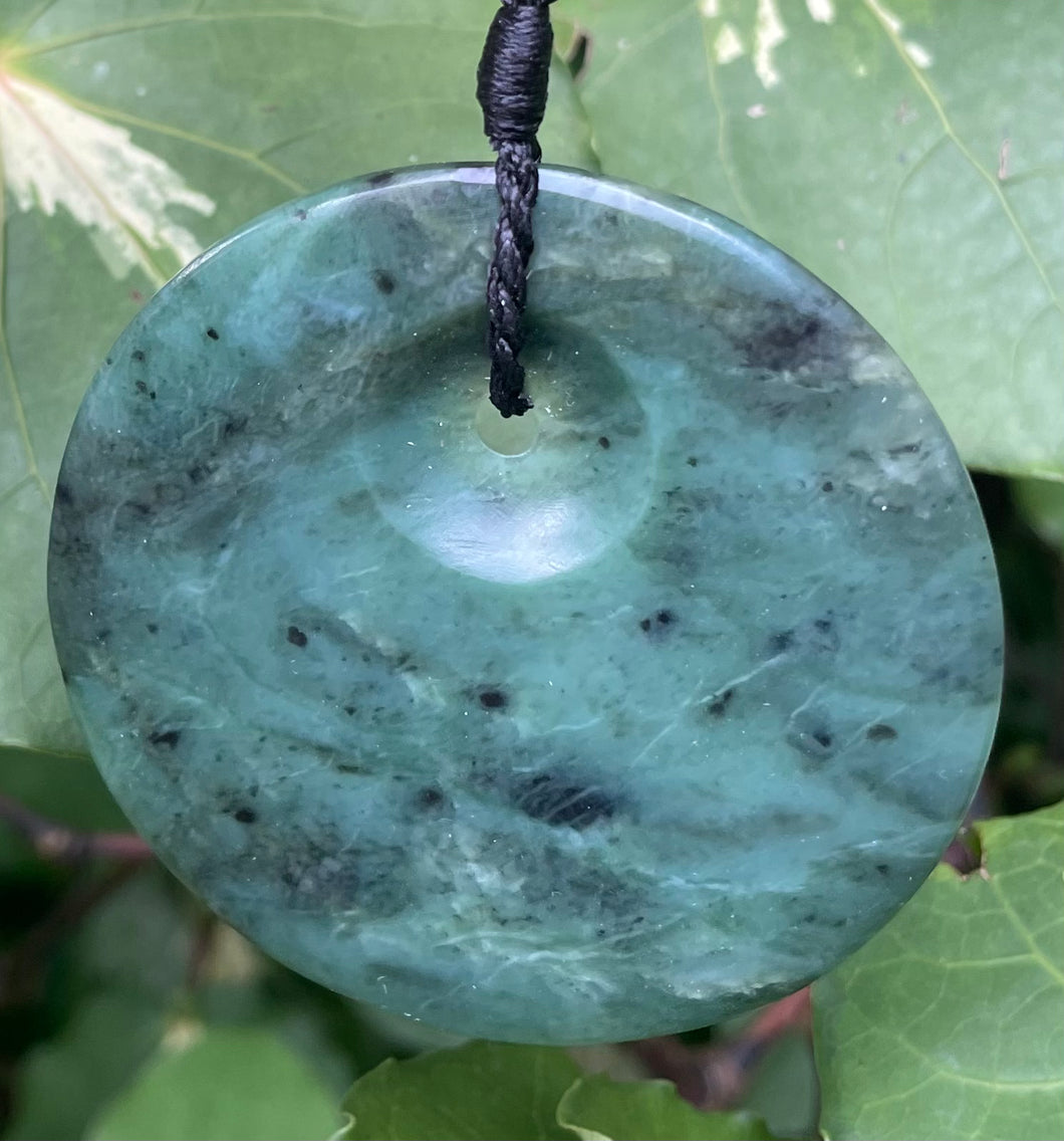 NEW ZEALAND GREENSTONE - POUNAMU - CIRCULAR - 65MM